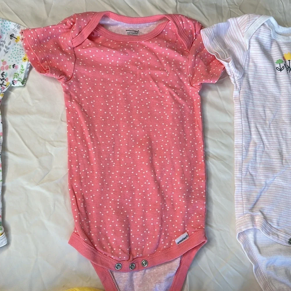Onesie brand set of 7, size 6-9 month short sleeve bodysuits. GREAT CONDITION.